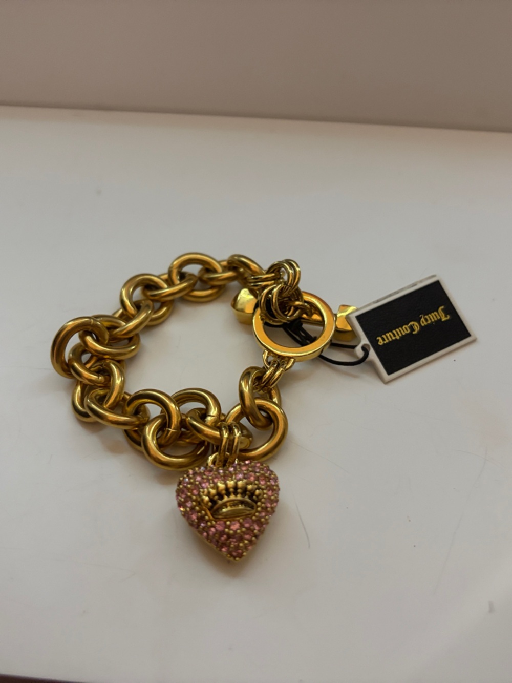 Juicy Couture Gold-Tone Link Bracelet with Pink Crystal Heart Crown Charm
